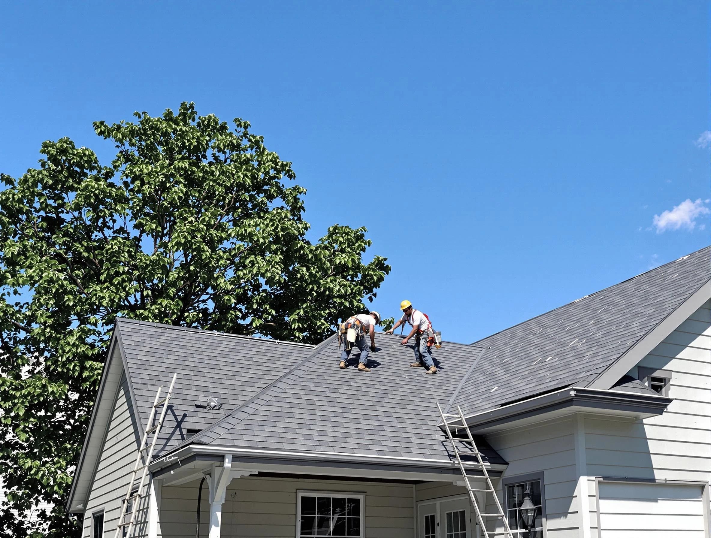 Parma Heights Roofing Company crew finalizing a roof installation in Parma Heights, OH