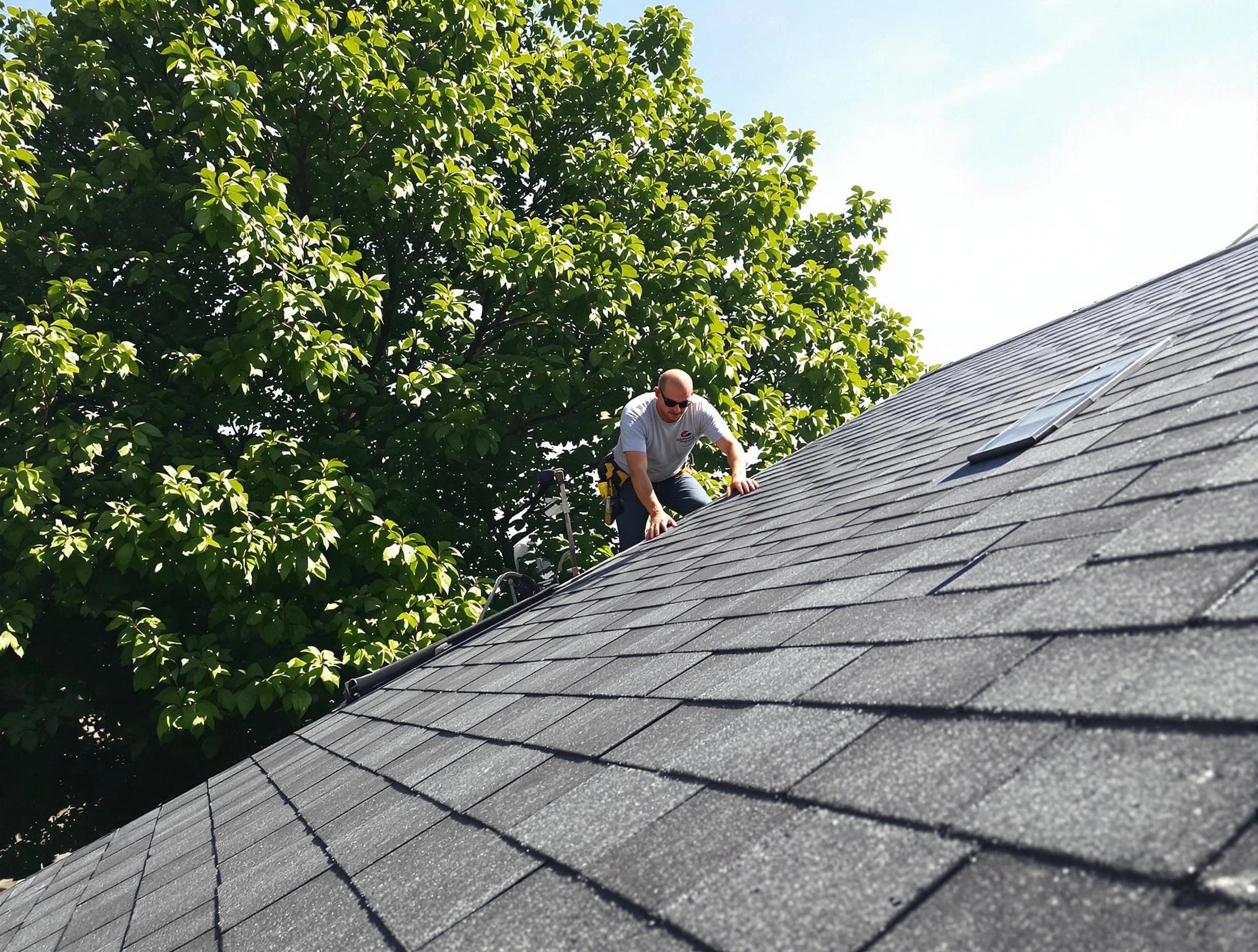 Certified roofers from Parma Heights Roofing Company working in Parma Heights, OH